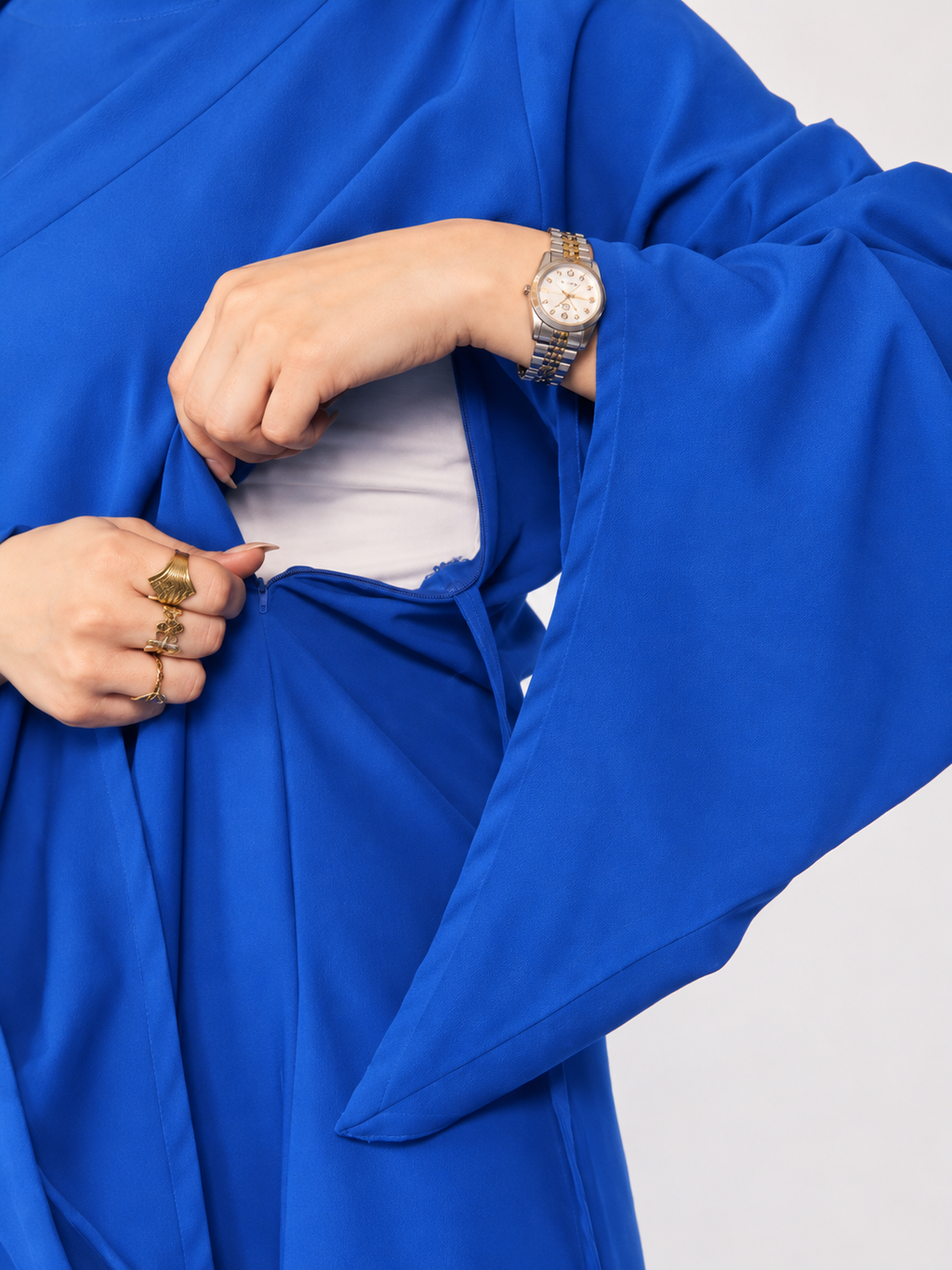 Hidden zipper nursing access on cobalt maternity maxi dress
