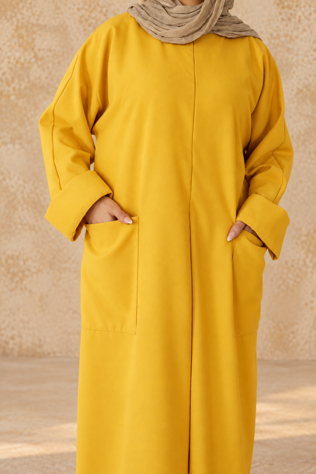 Pocket detail on marigold maternity and nursing dress