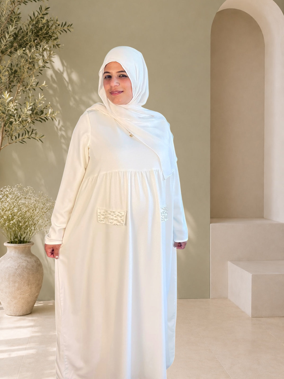 Ivory maternity maxi dress with turtleneck and long sleeves — modest formal pregnancy dress