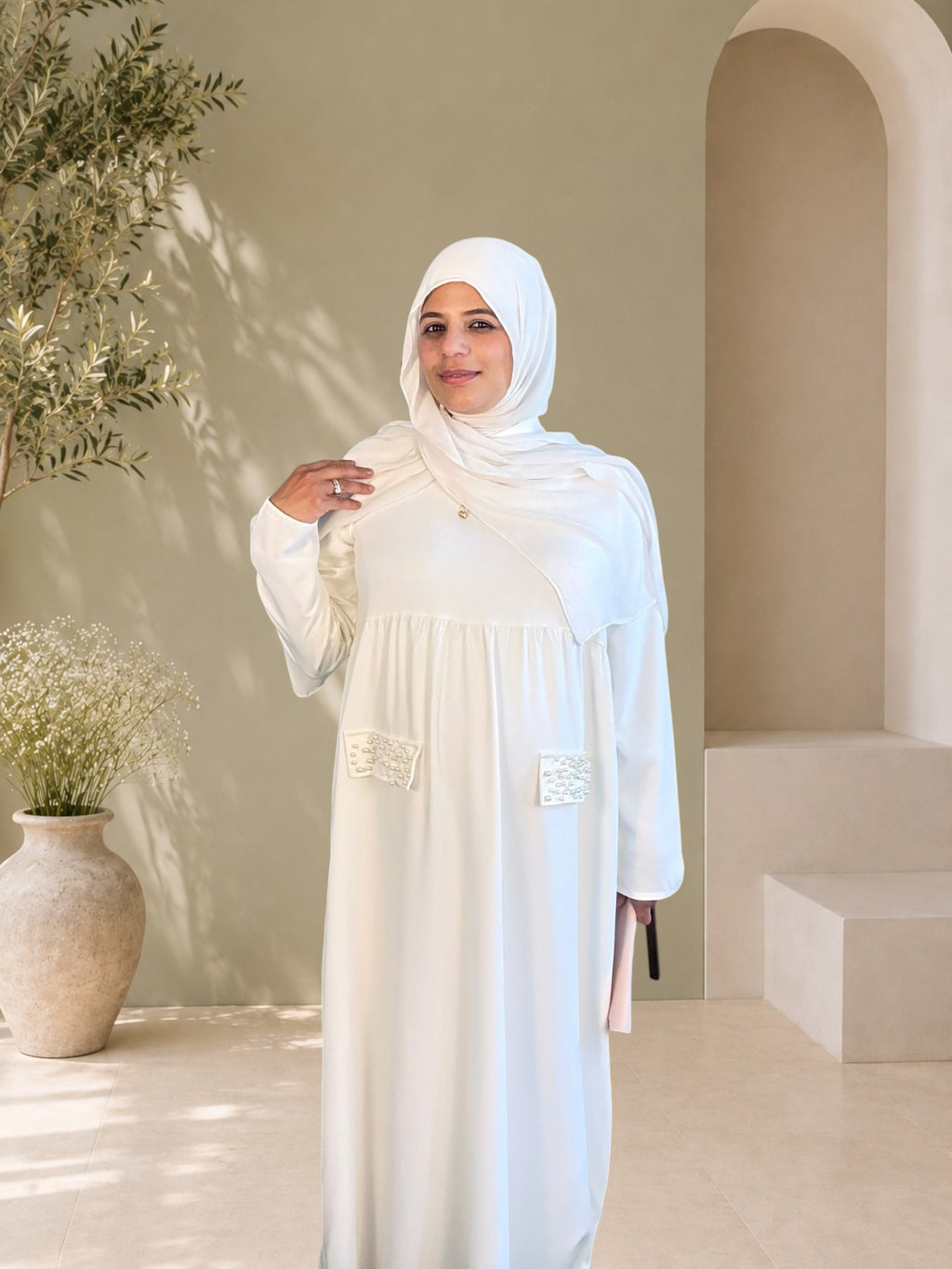 Front view of ivory chiffon maternity gown — modest baby shower and occasion dress