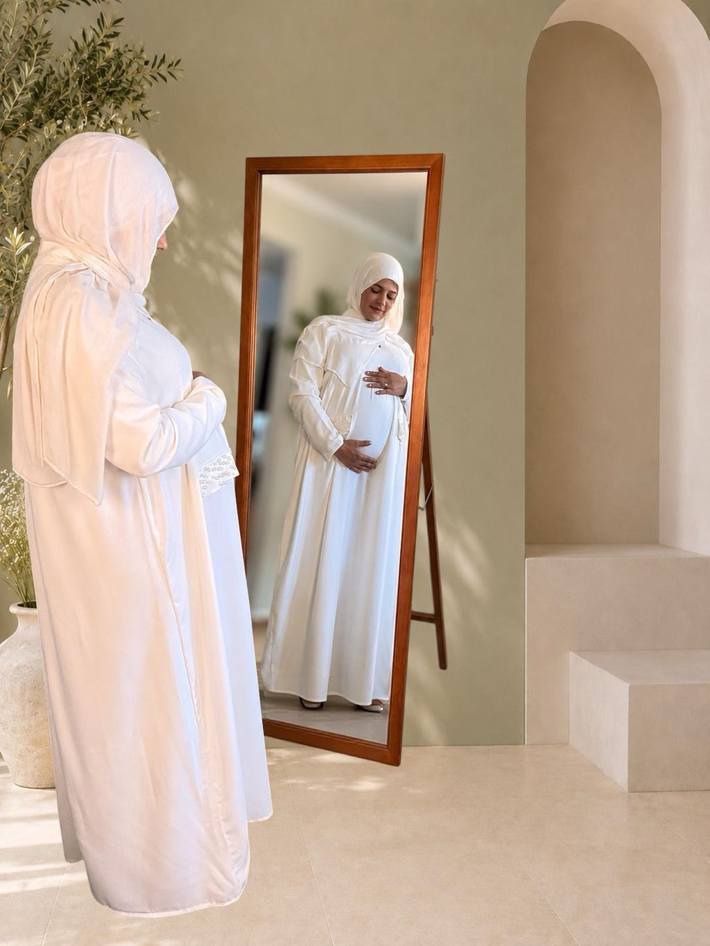 Mirror shot of ivory chiffon maternity maxi dress — modest elegant pregnancy gown