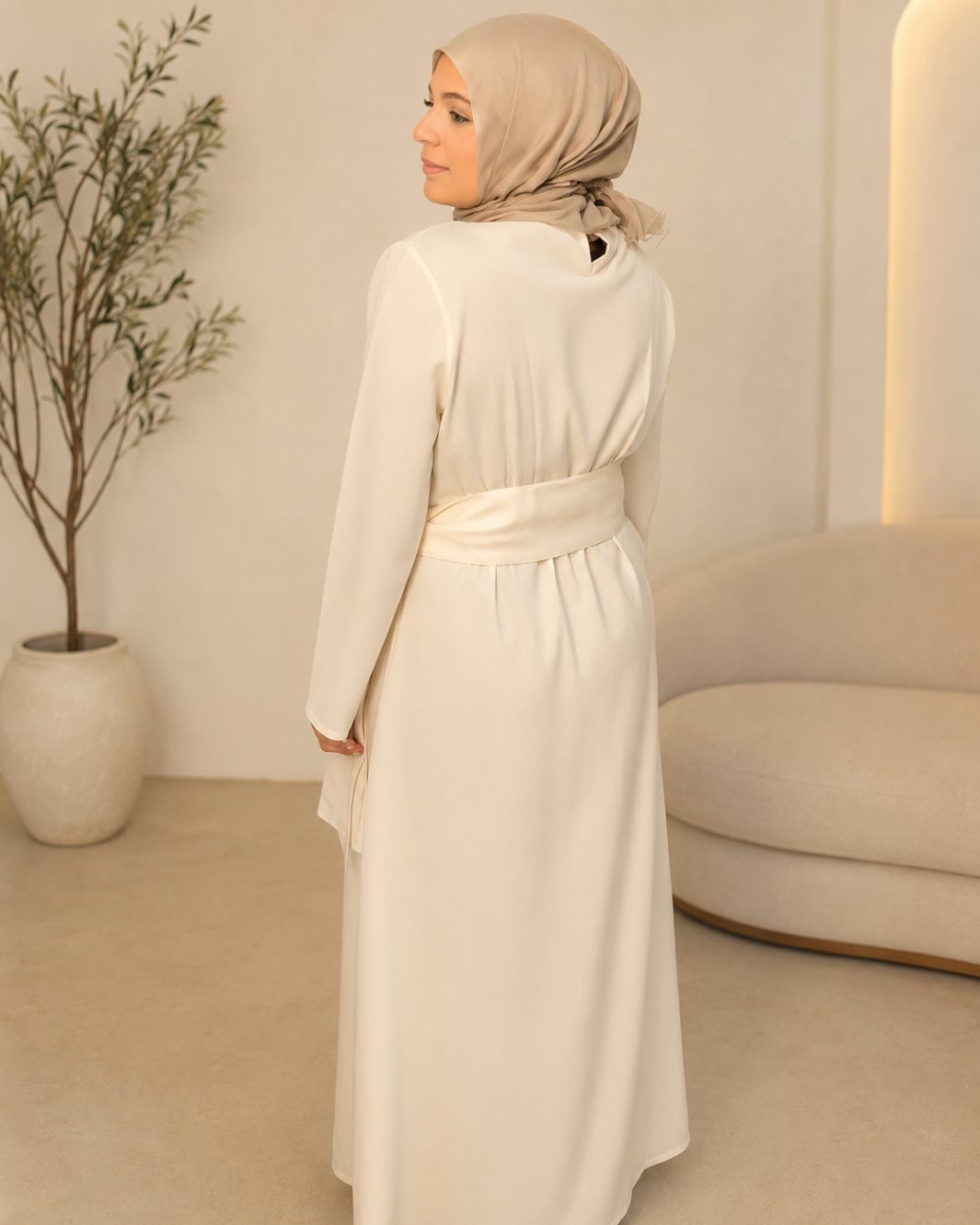 Back view of ivory linen nursing maxi dress with adjustable belt tie — modest breastfeeding hijabi nursing dress
